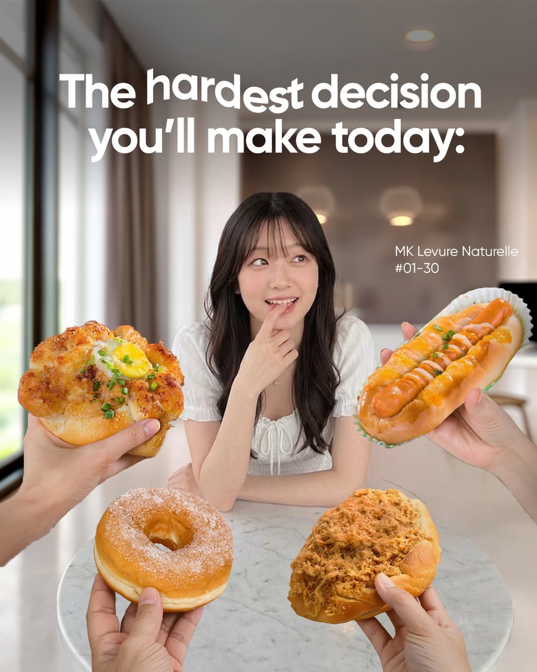 MK Levure Naturelle bakery assortment of artisan buns including cheese herb bun, powdered sugar donut, meat floss bun, and sausage roll at Kallang Wave Mall #01-30