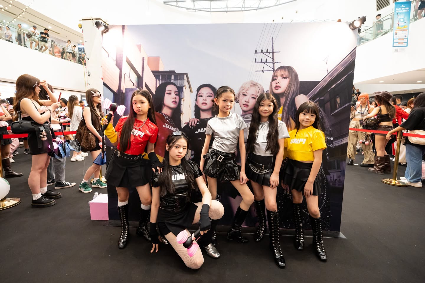 Fans enjoying the lively atmosphere at The Pre Show Playground event.