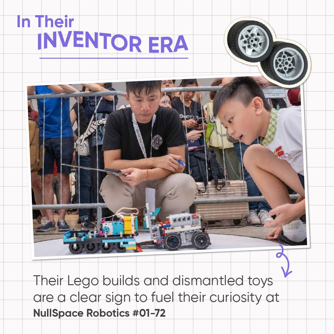 Students engaged in a robotics class, working on electronic components.