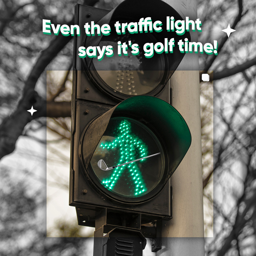 Golfer preparing to swing in an indoor simulator bay